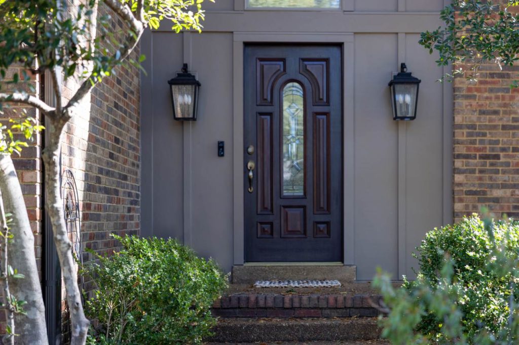 Black entry door replaced on Memphis home by Bluff City Exteriors