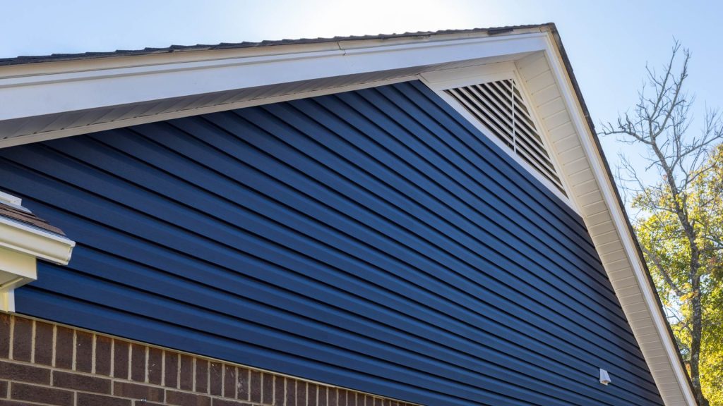 blue james hardie siding installed on greater memphis area home by bluff city exteriors