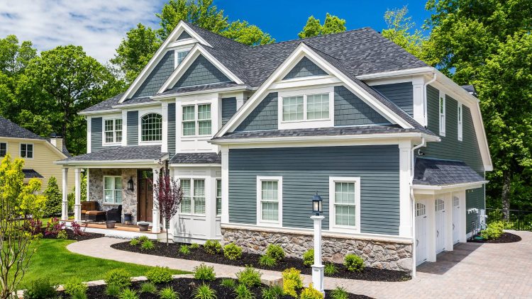 light blue james hardie siding installed on greater memphis area home by bluff city exteriors