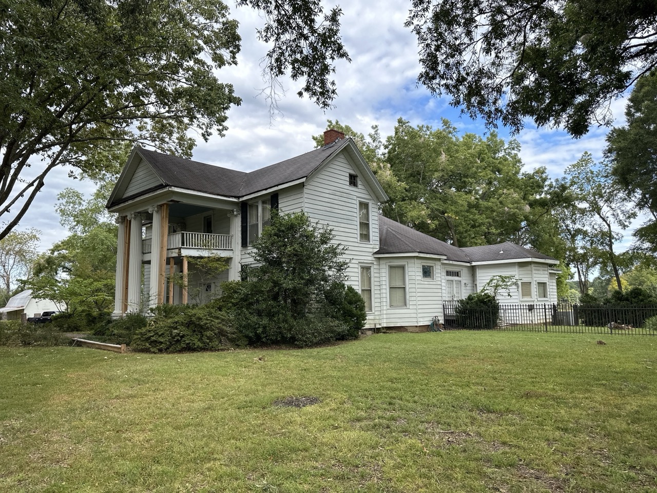 Before Piperton exterior remodel on Piper House with new siding and more