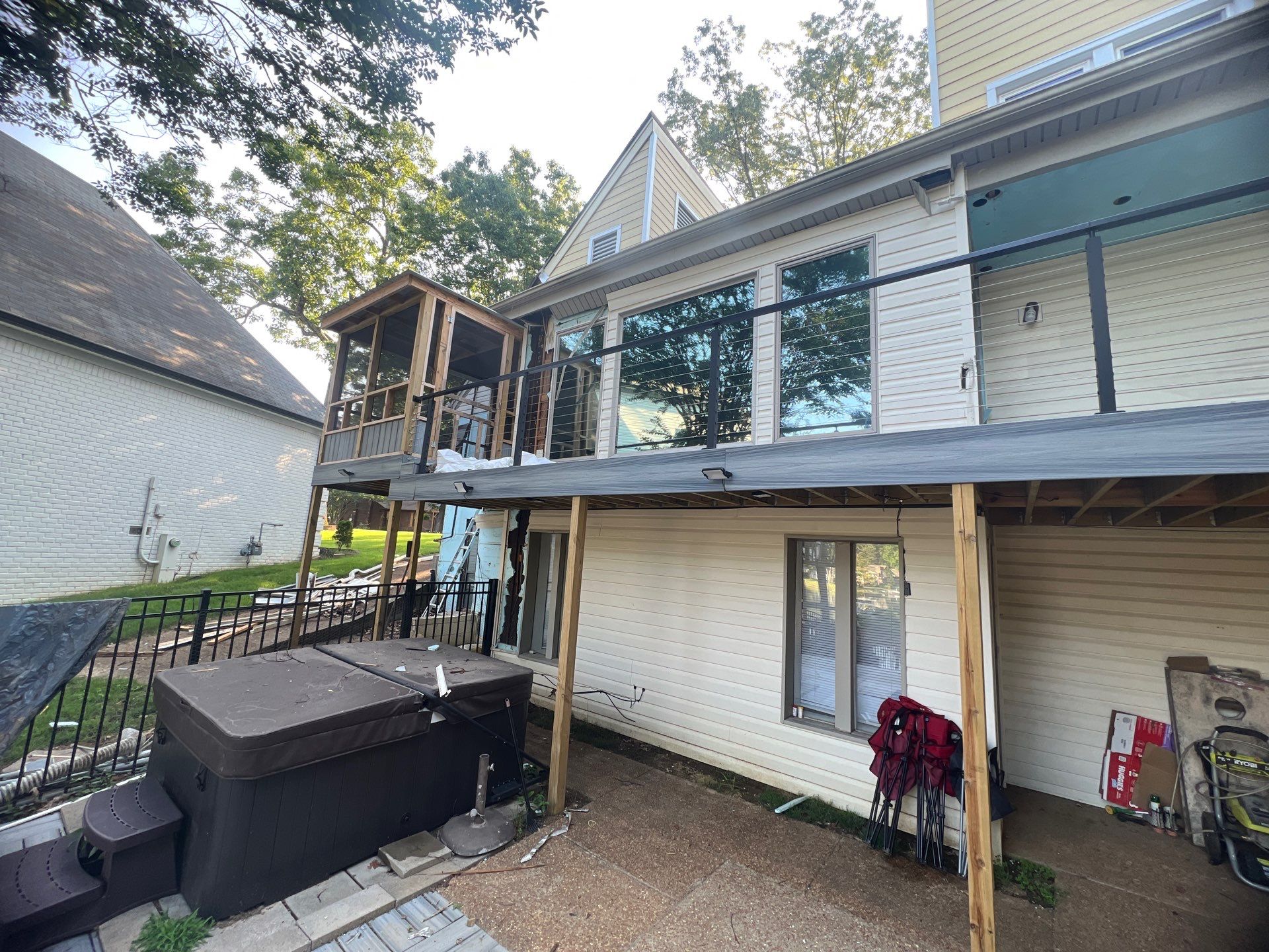 before lakeland hardie siding installation on lake house